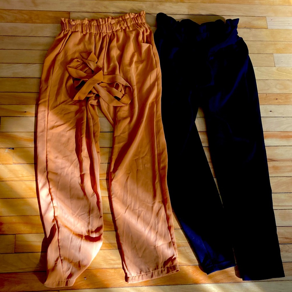 2 pairs of Charlotte Russe professional pants.